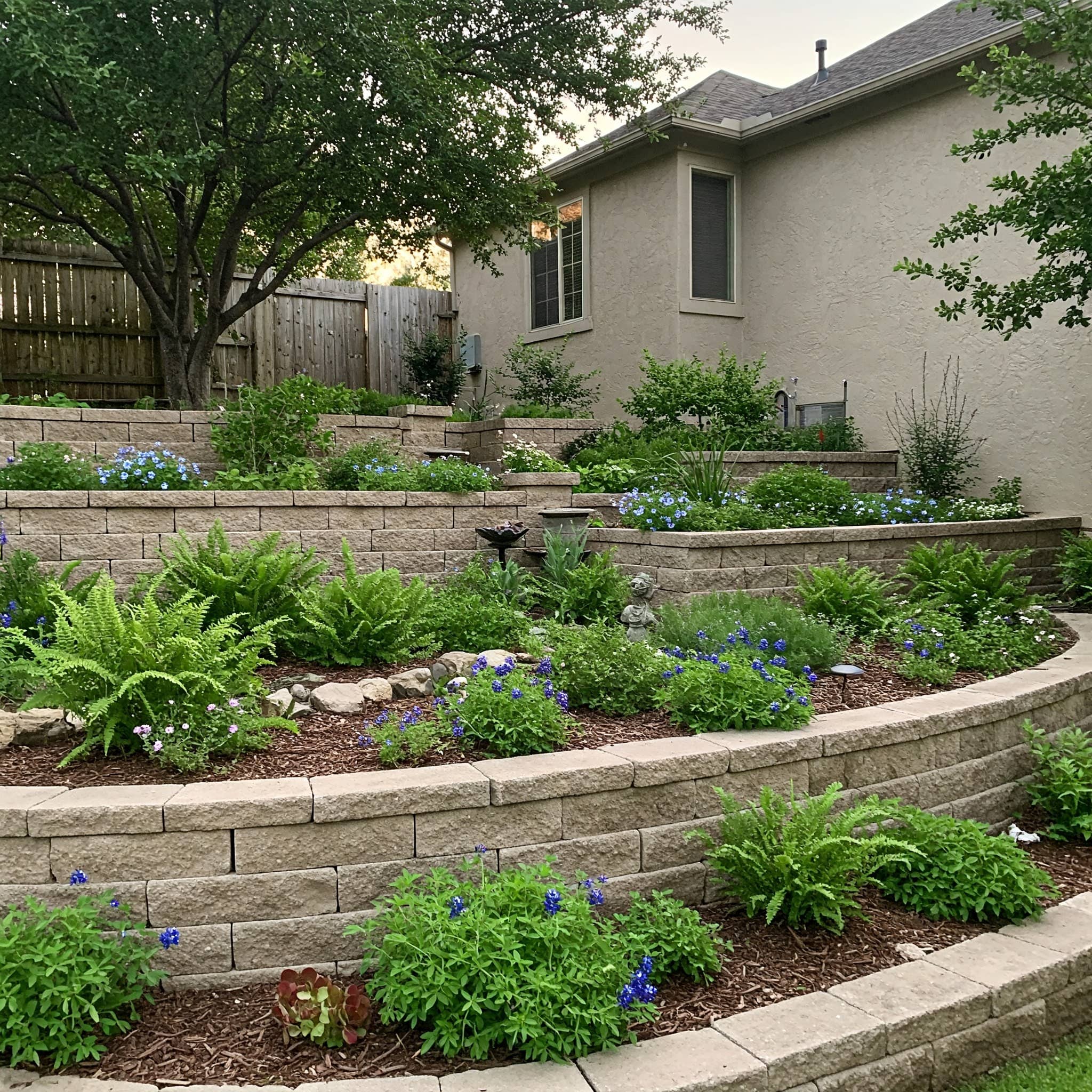 Terraced plant bed retaining walls