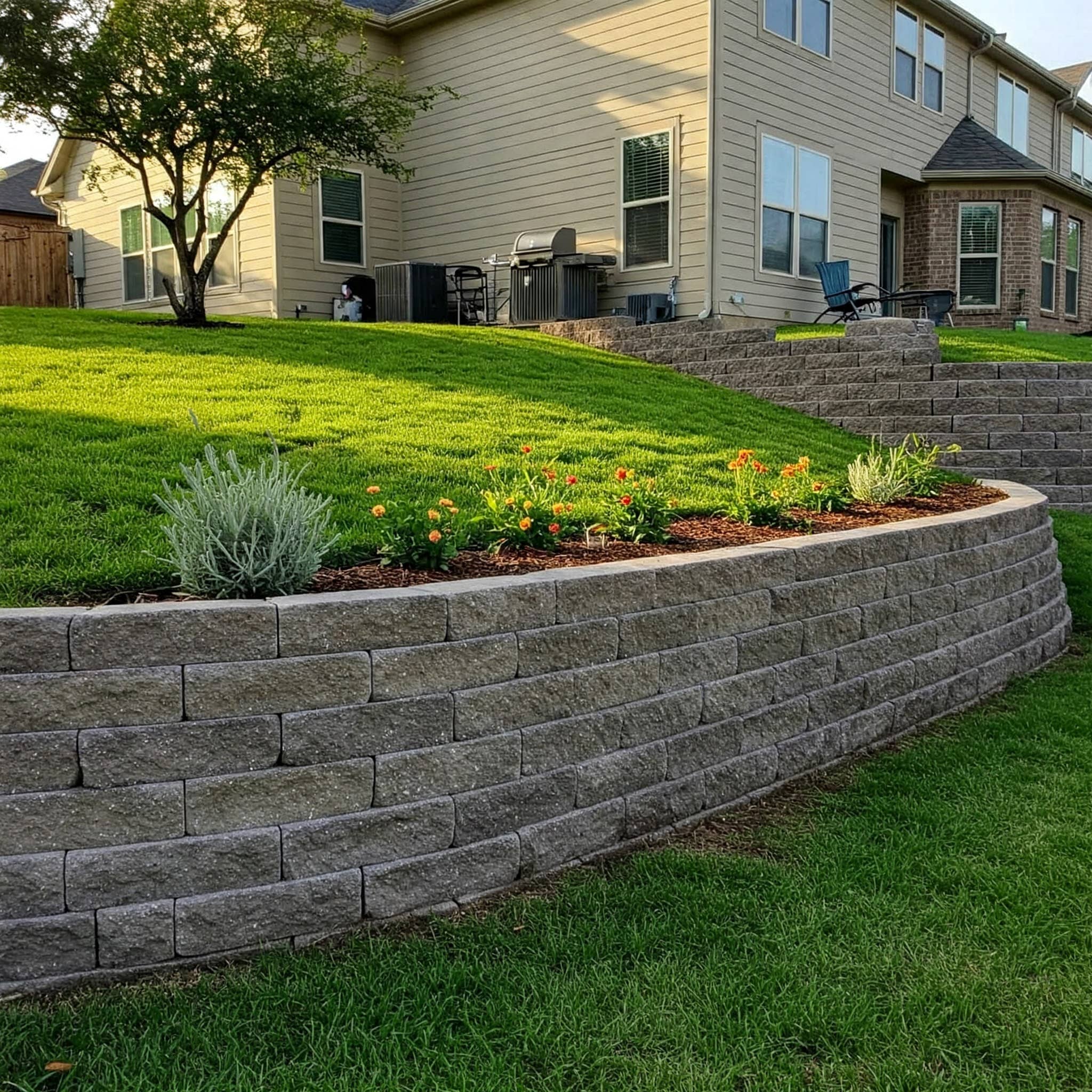 Sloped yard retaining wall